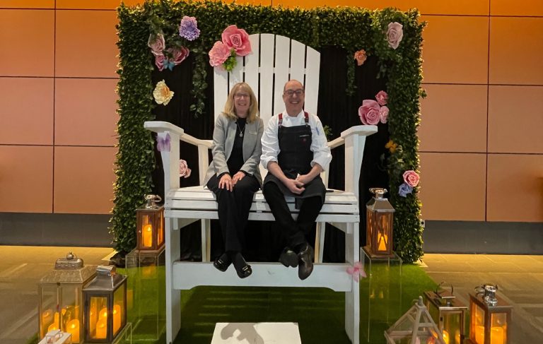 two people on a very large chair