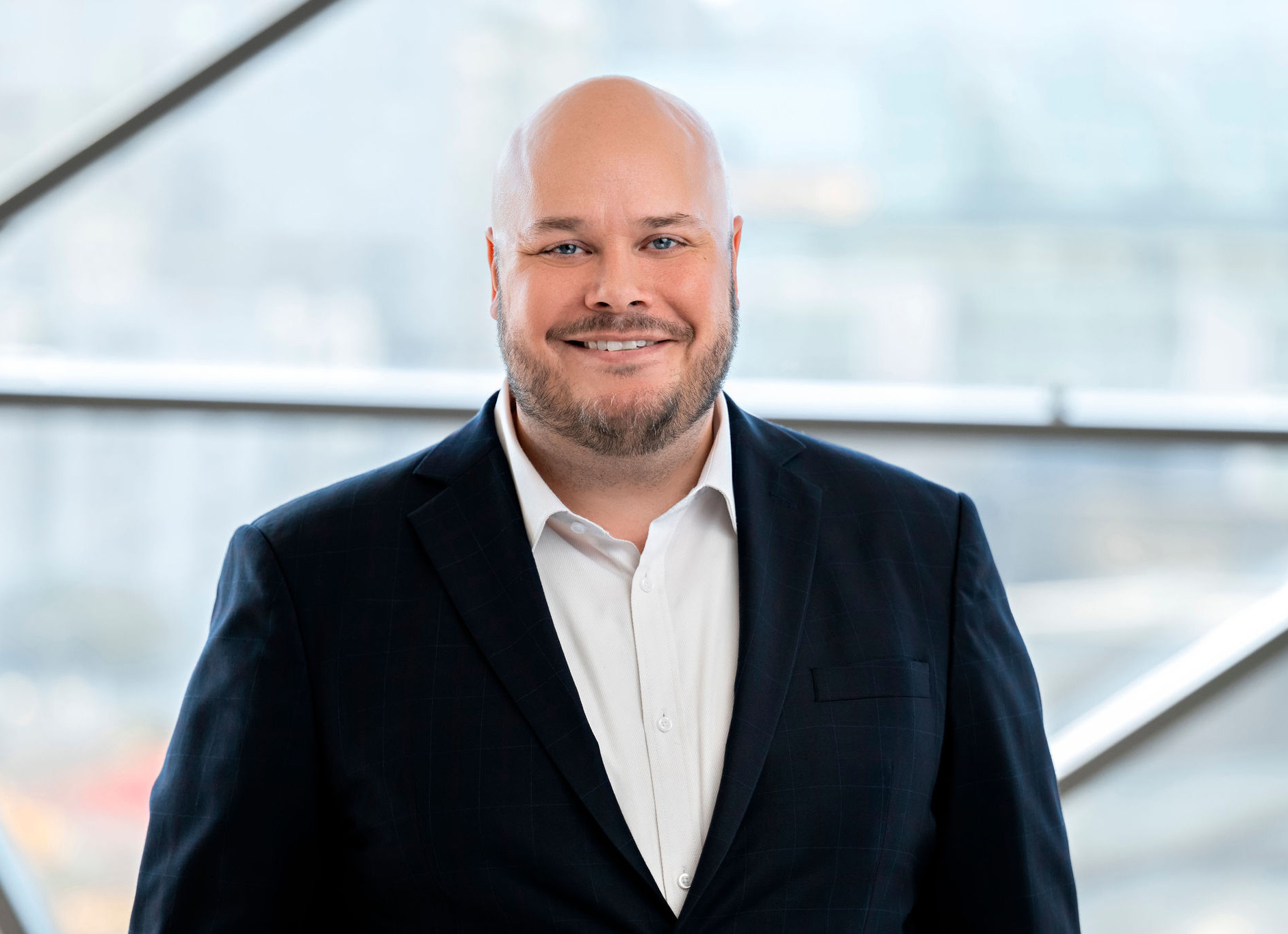 Headshot of Michael Crockatt.