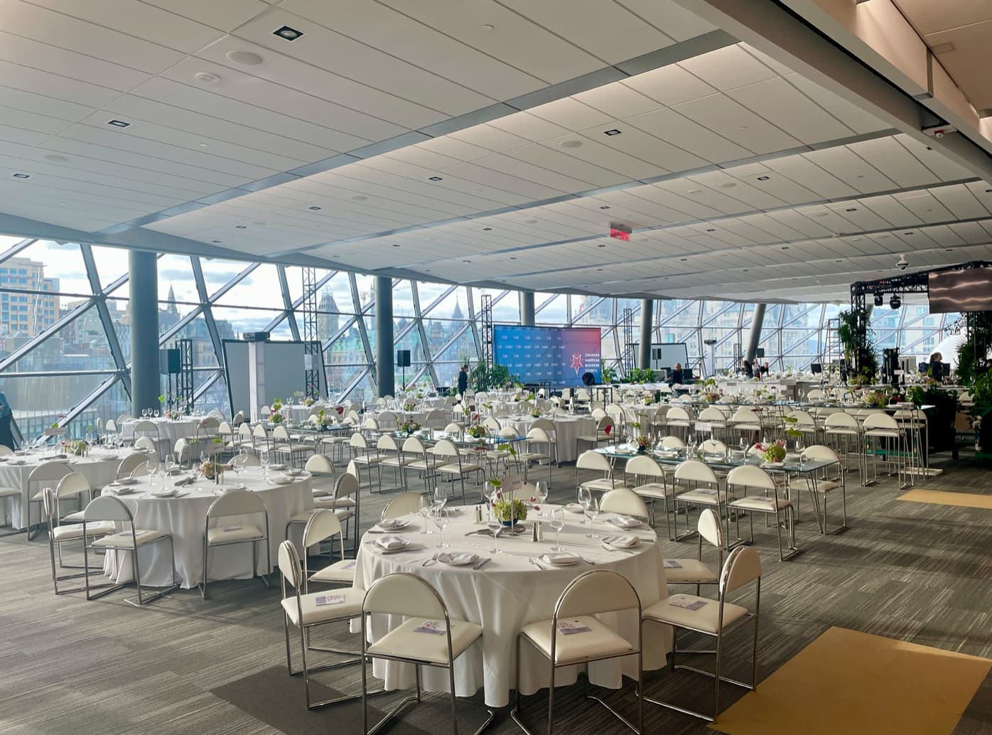 Numerous tables set in a hall