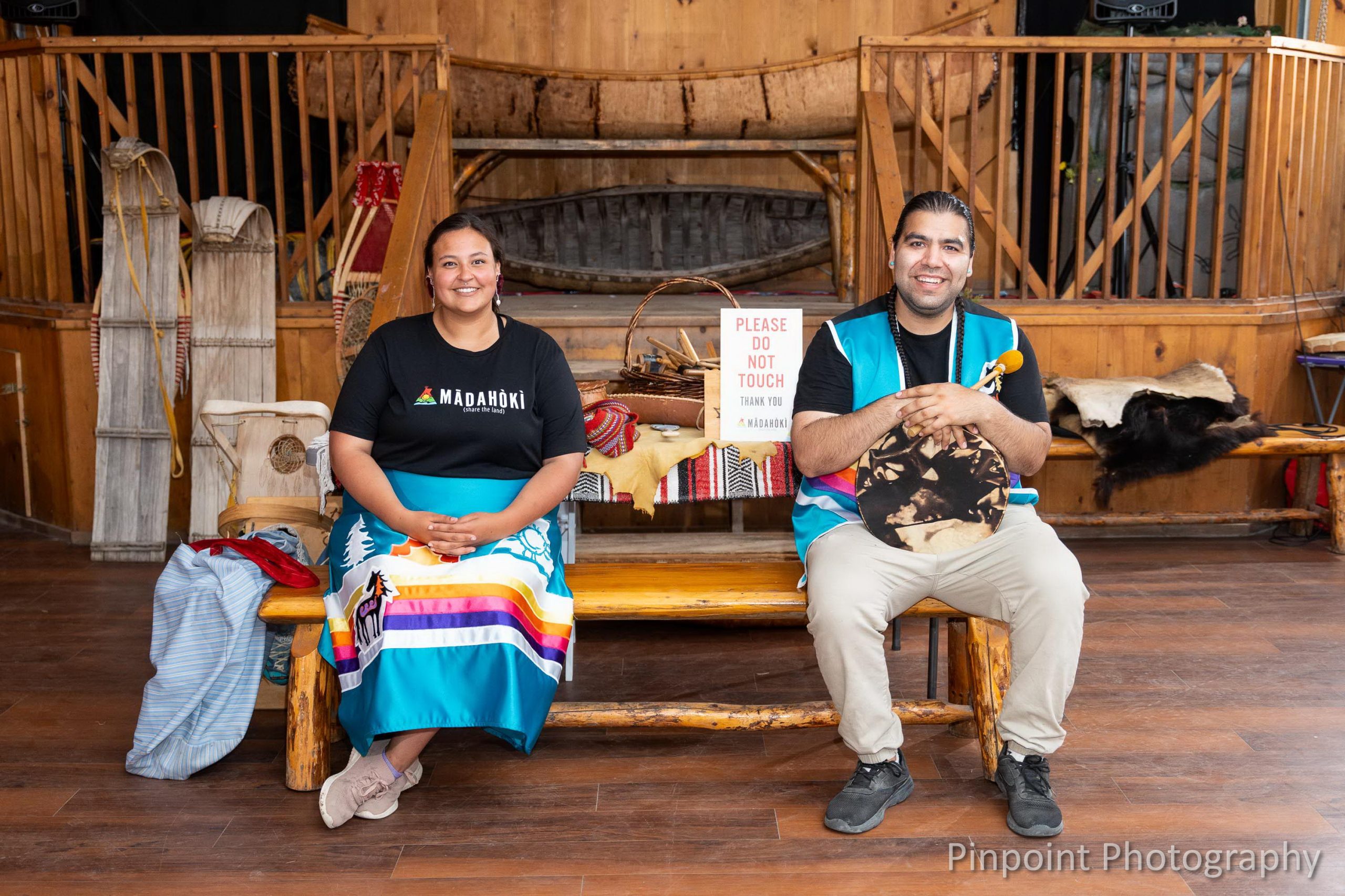 Mādahòkì Farm Employees sitting on a bench