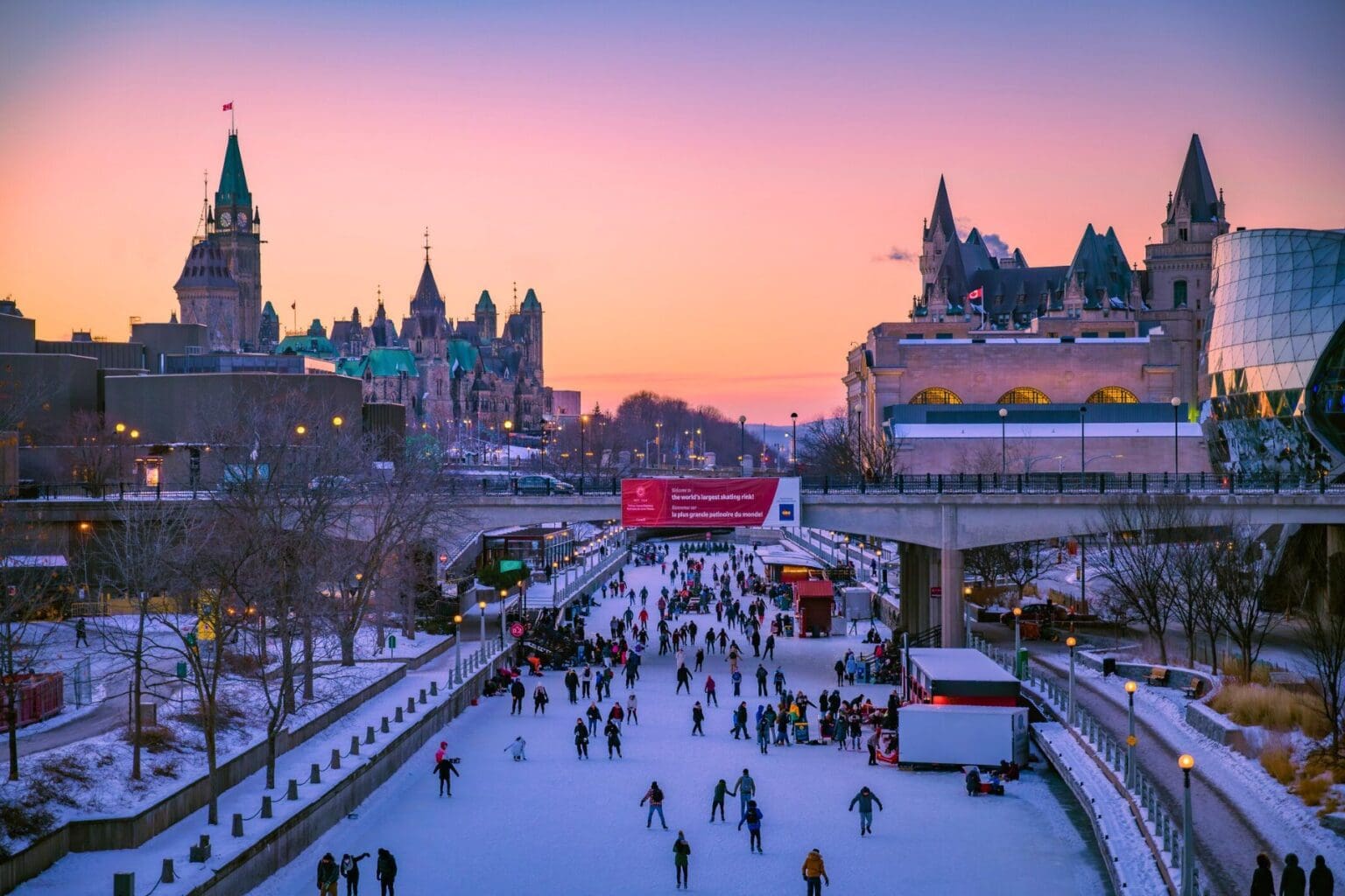 Rideau Canal at sunset with skaters